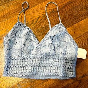 Short light baby blue top.
